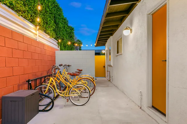 a view of a chairs and table in the patio