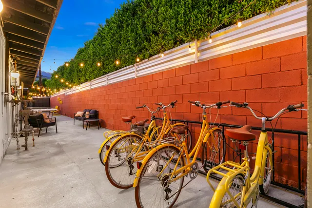 a view of a swimming pool with an outdoor seating