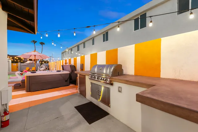 a outdoor space with pool lots of furniture and garden