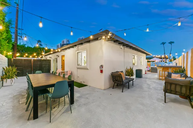 a view of a bedroom with baby crib furniture and toys
