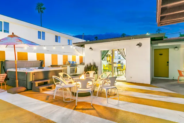 a view of swimming pool with seating area