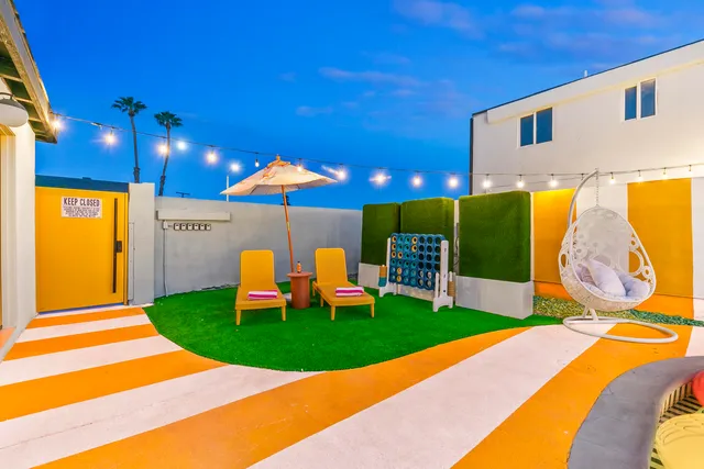 a view of a swimming pool with seating area