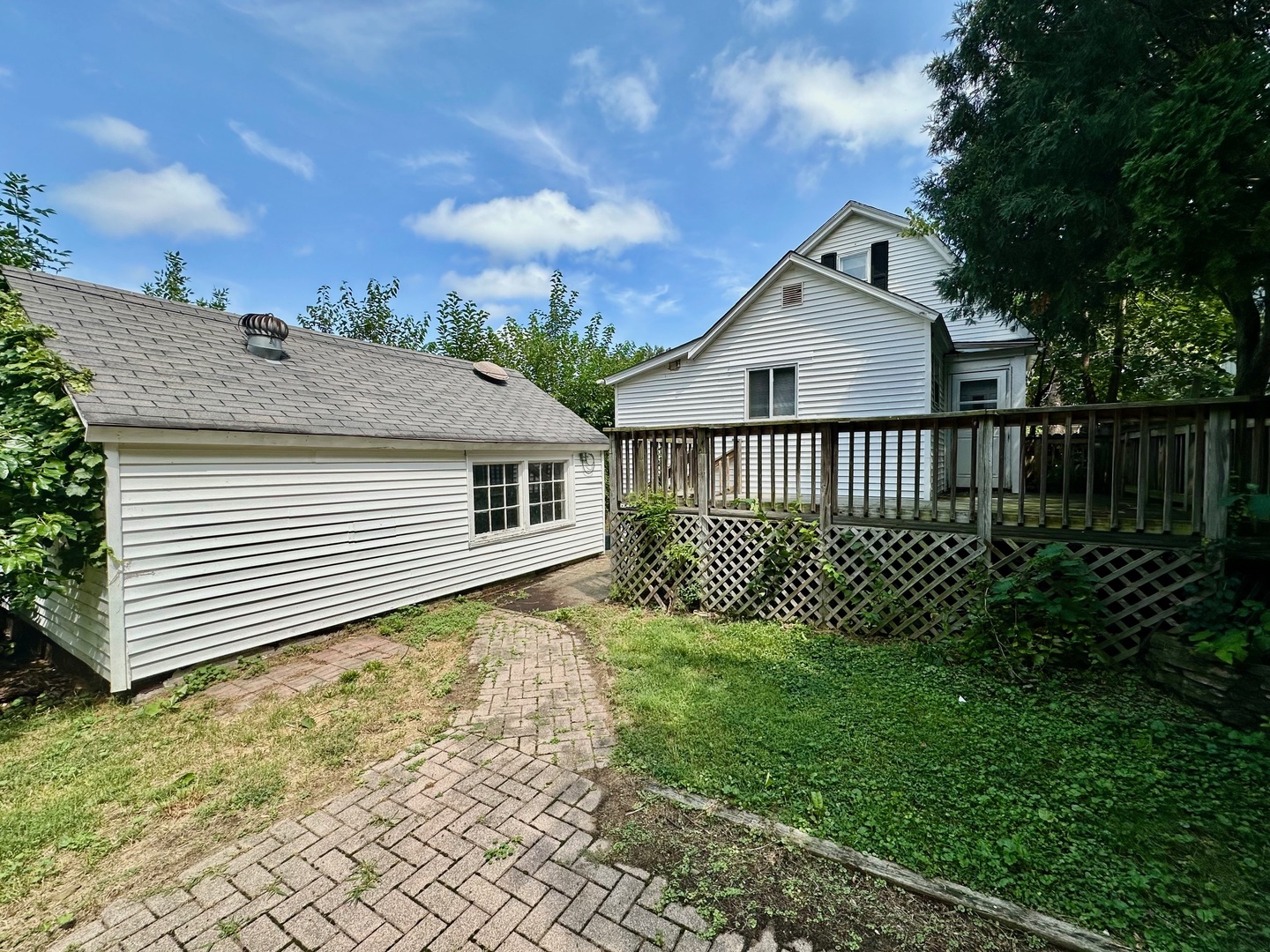 50 Sheridan Street Elgin, IL 60123 - Photo 20 of 21 a view of a house with a yard