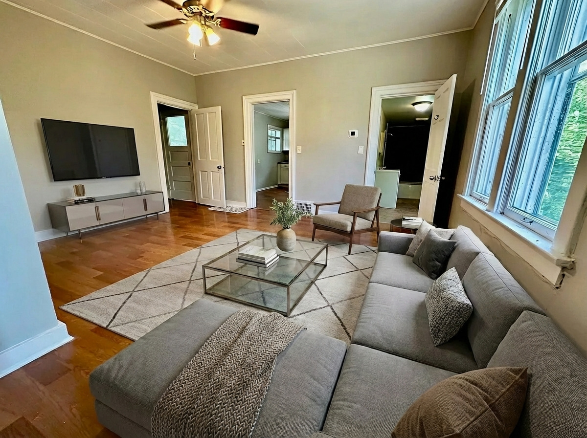 50 Sheridan Street Elgin, IL 60123 - Photo 6 of 21 a living room with furniture and a flat screen tv