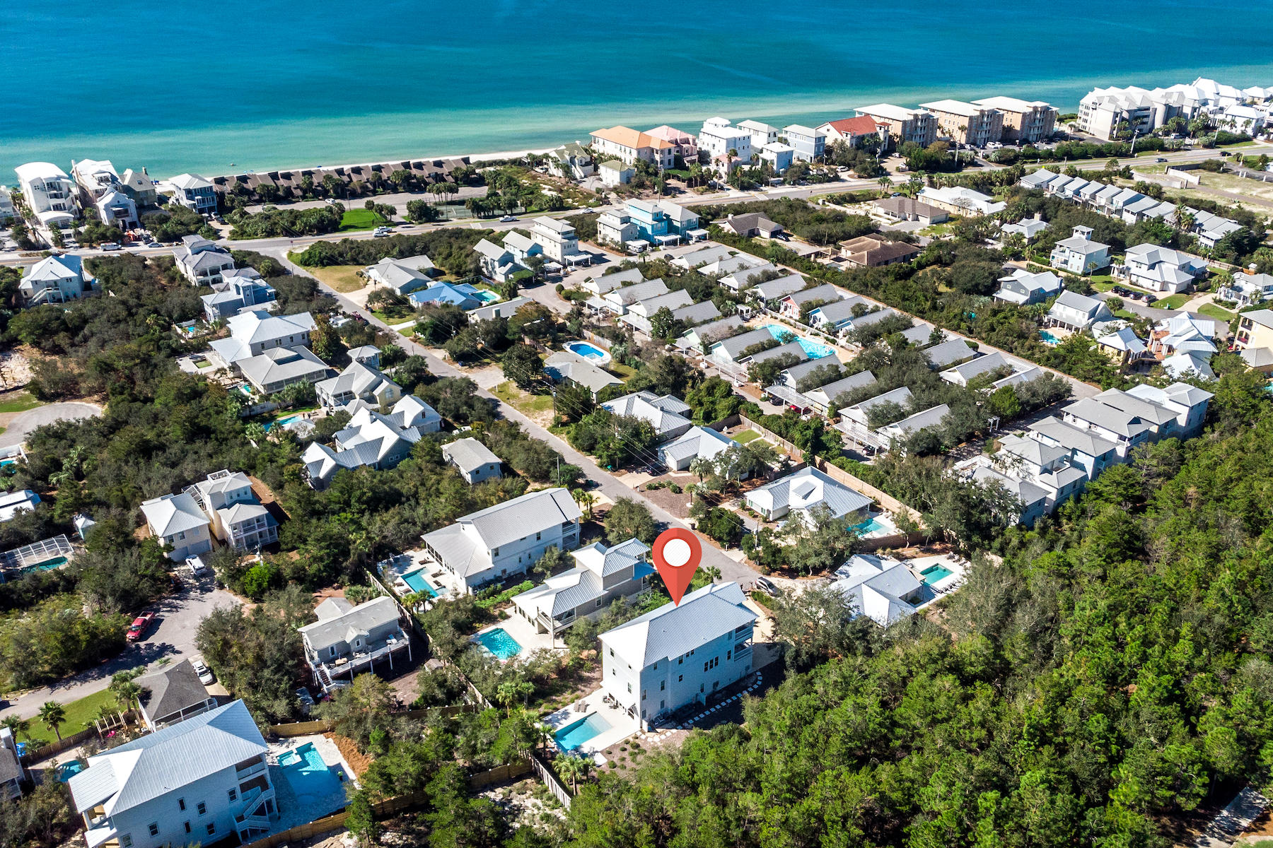 150 Walton Gulfview Dr Inlet Beach Inlet Beach, FL 32461 - Photo 14 of 61 an aerial view of a city with lots of residential buildings and ocean view in back