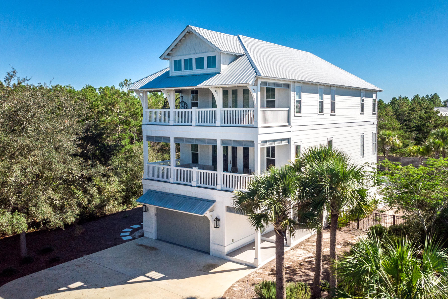 150 Walton Gulfview Dr Inlet Beach Inlet Beach, FL 32461 - Photo 2 of 61 a front view of a house with a yard