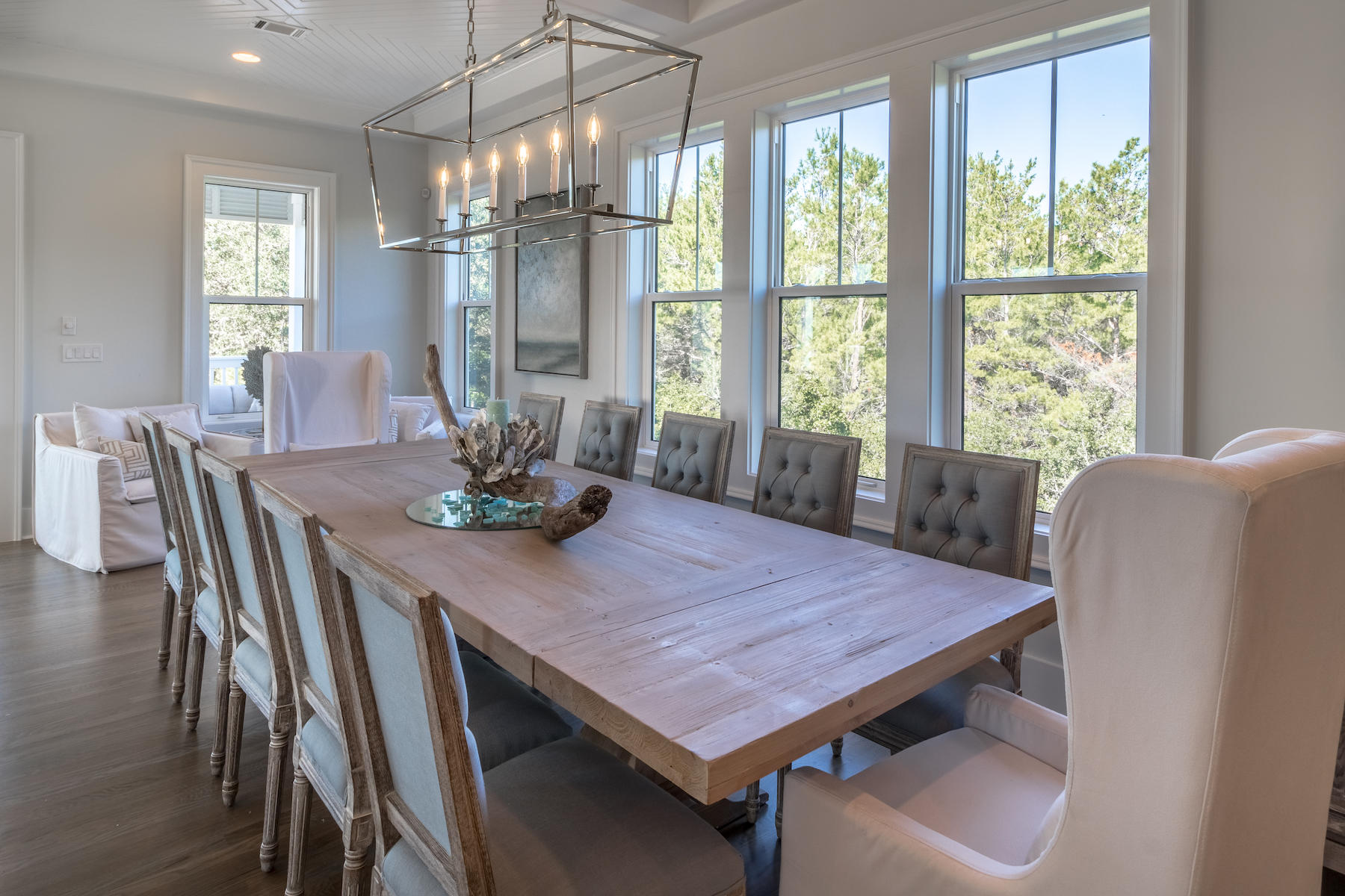 150 Walton Gulfview Dr Inlet Beach Inlet Beach, FL 32461 - Photo 29 of 61 a dining room with furniture a chandelier and wooden floor