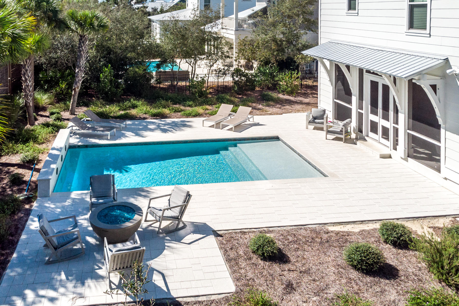 150 Walton Gulfview Dr Inlet Beach Inlet Beach, FL 32461 - Photo 4 of 61 a view of a patio with chairs and potted plants