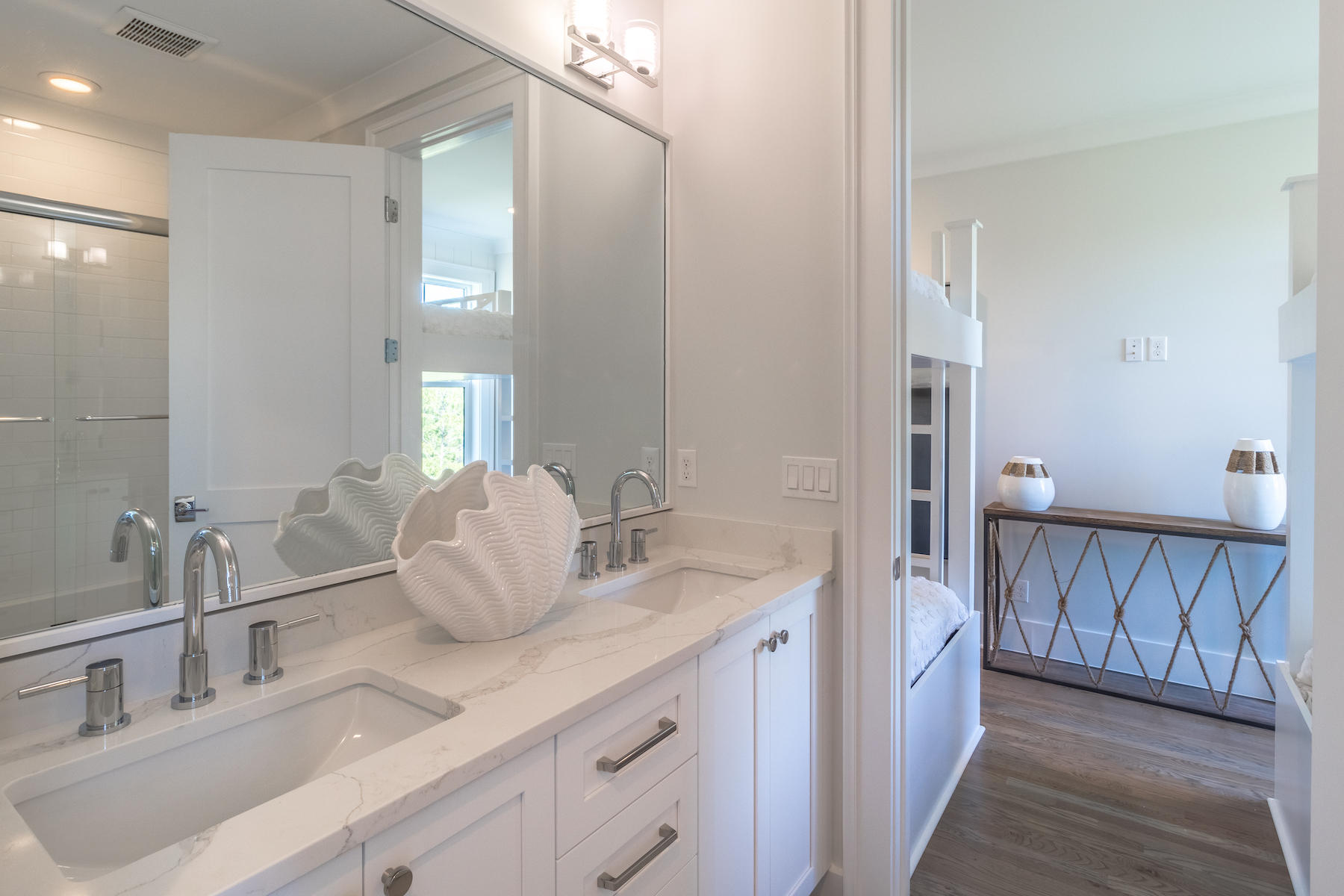 150 Walton Gulfview Dr Inlet Beach Inlet Beach, FL 32461 - Photo 45 of 61 a bathroom with double vanity sink and a mirror