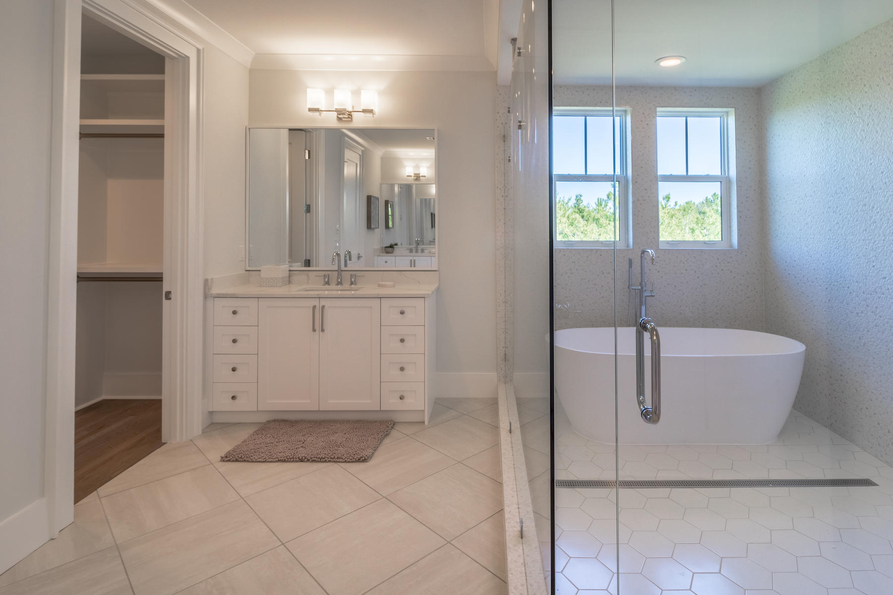 150 Walton Gulfview Dr Inlet Beach Inlet Beach, FL 32461 - Photo 54 of 61 a spacious bathroom with a granite countertop sink a mirror and a bathtub
