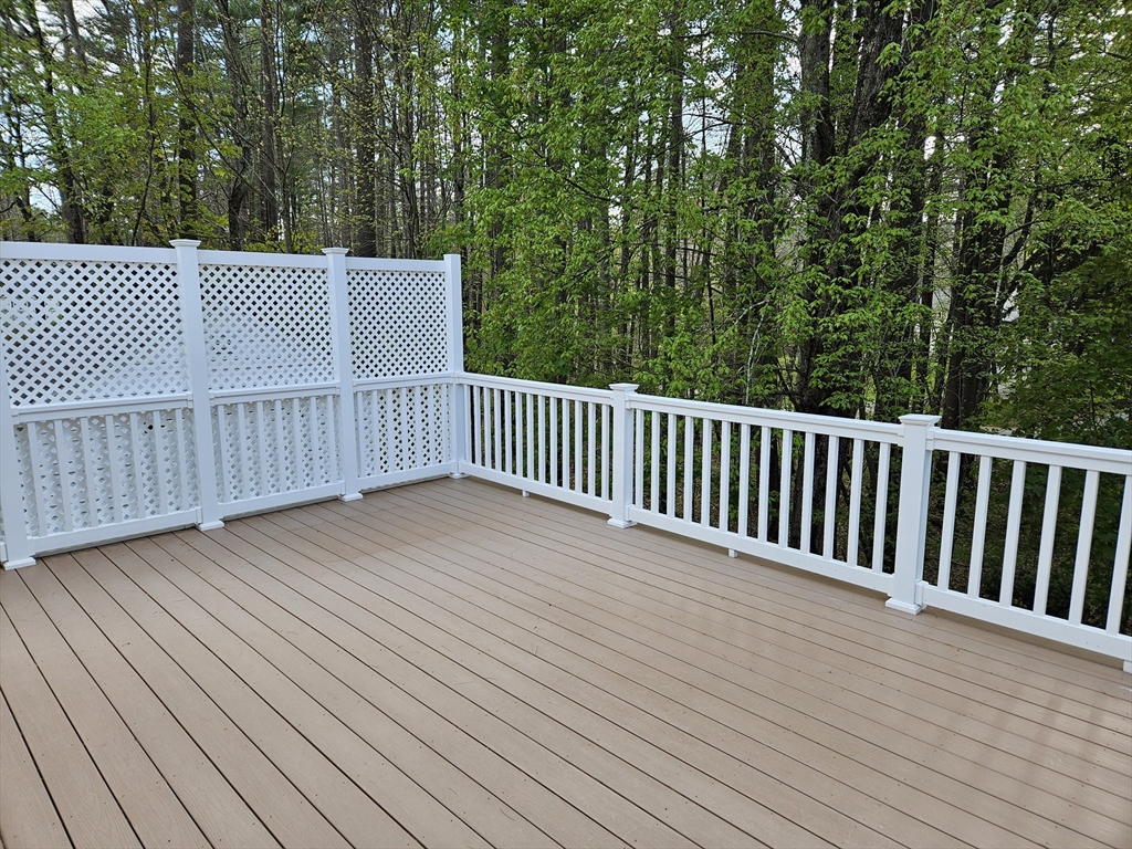 135 Walker Pond Road Sturbridge, MA 01566 - Photo 6 of 16 a view of a wooden deck