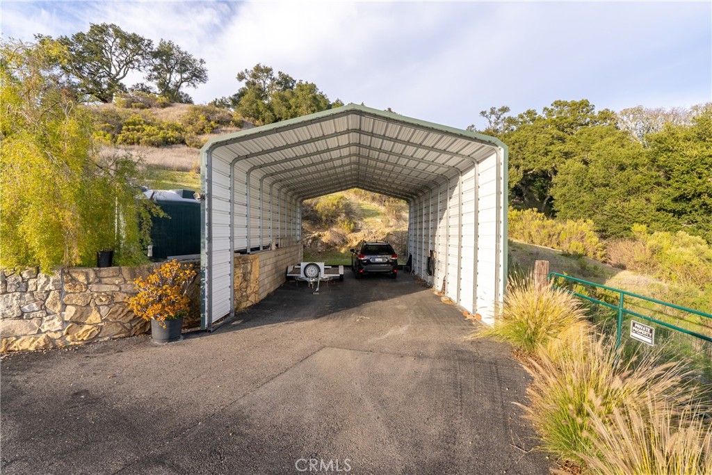 4342 Shadow Canyon Road Templeton, CA 93465 - Photo 49 of 72 This RV shelter offers not only protection but also the convenience of electricity, water, and a dump station for all your needs.