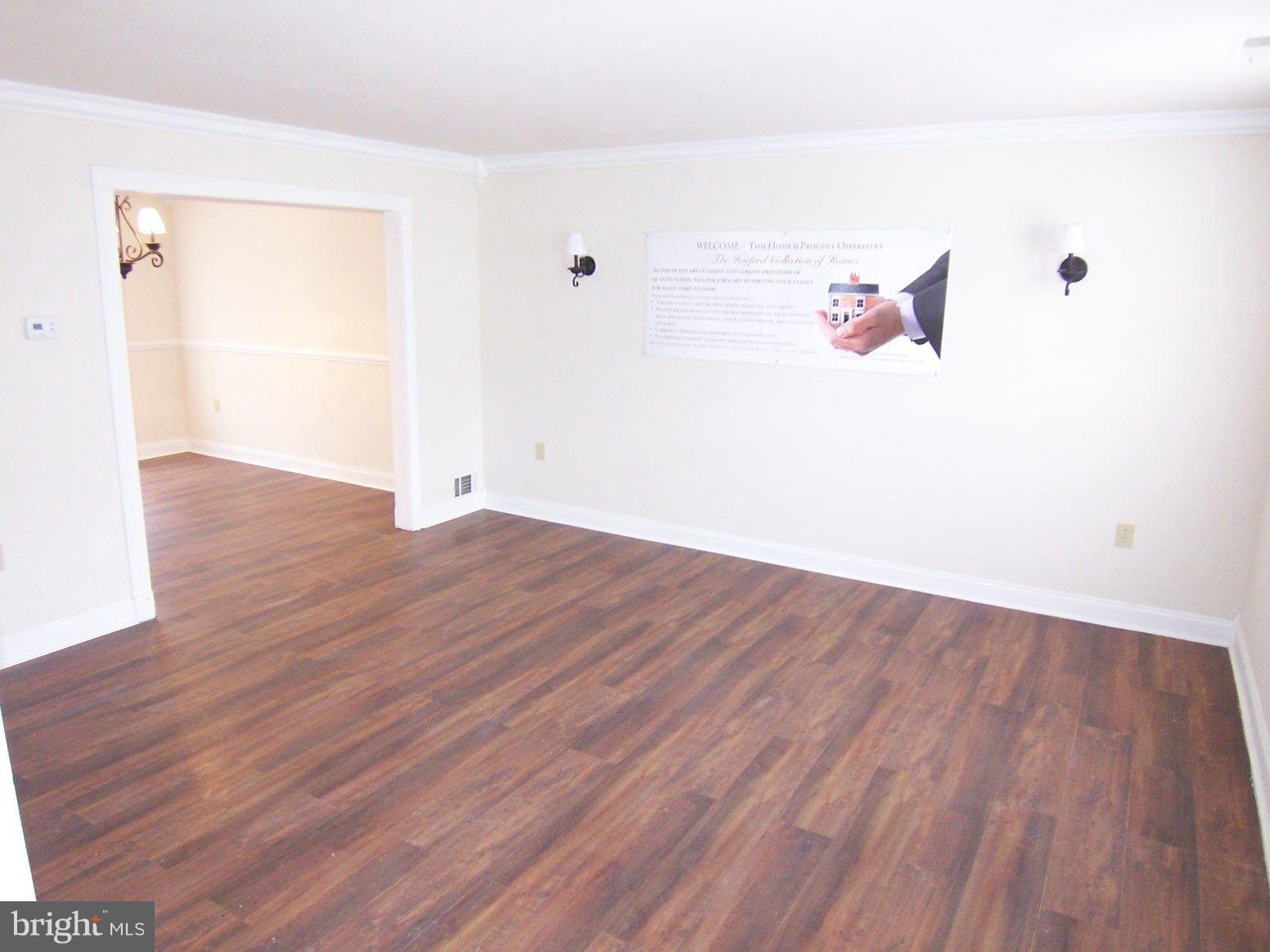 309 Laburnum Road Edgewood, MD 21040 - Photo 3 of 19 a view of a room with wooden floor