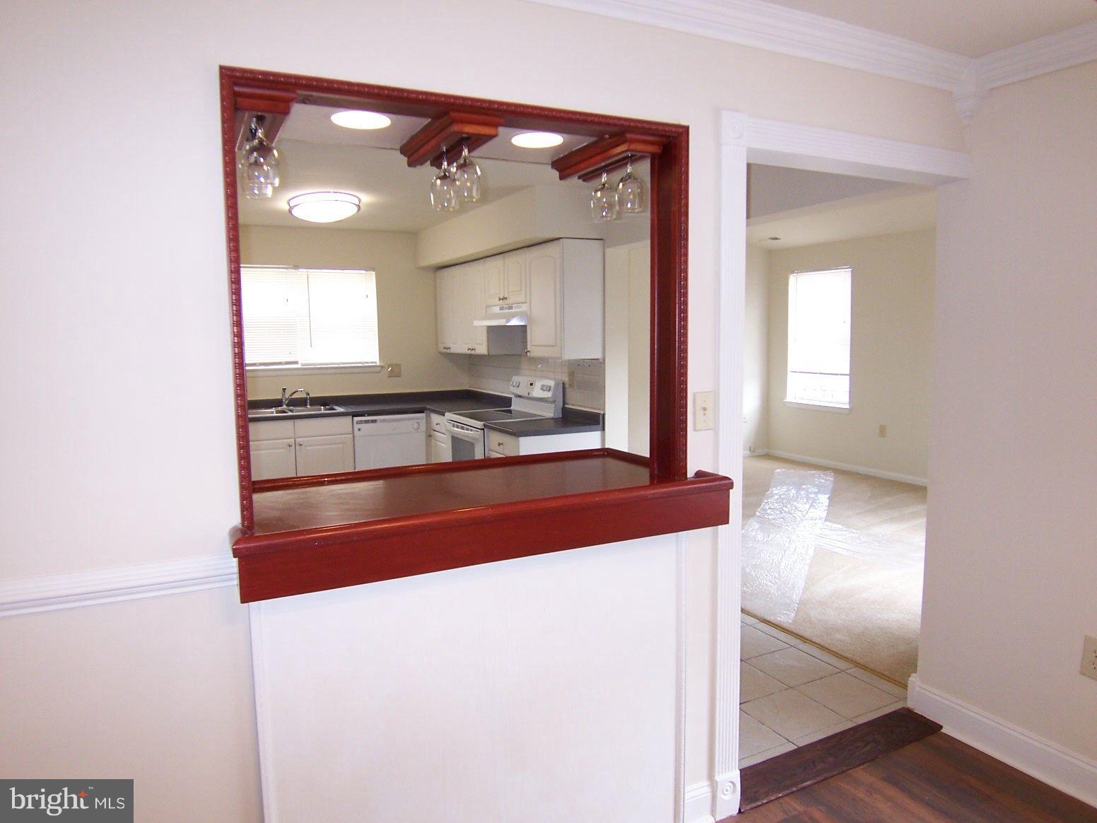 309 Laburnum Road Edgewood, MD 21040 - Photo 7 of 19 a kitchen view with granite countertop a stove and a refrigerator