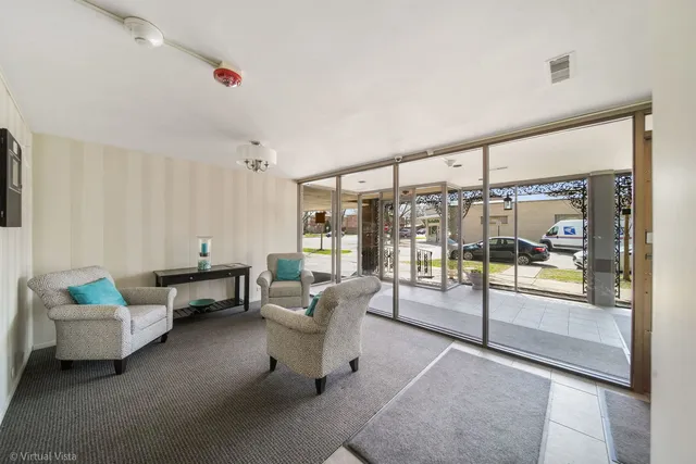 an aerial view of a house with a garden