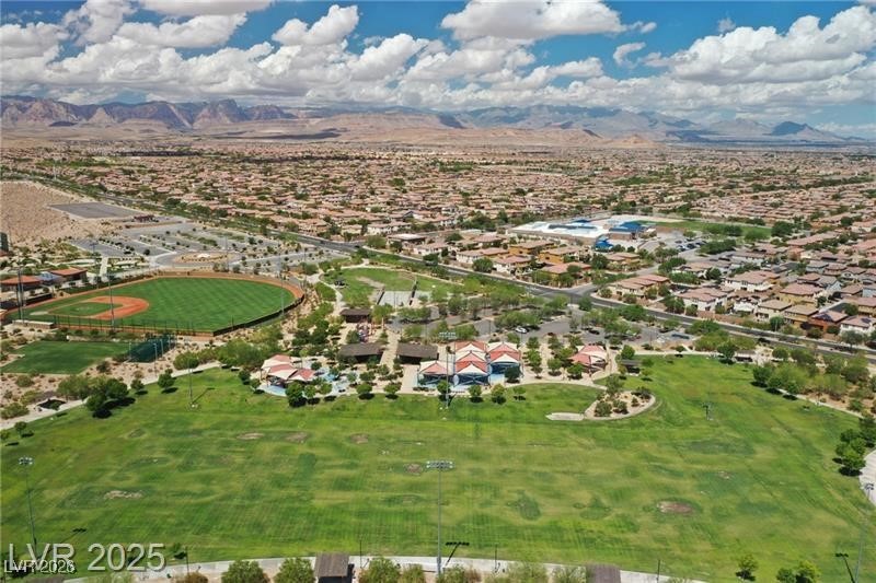9632 Staff Lane Las Vegas, NV 89178 - Photo 50 of 53 Aerial perspective of suburban area with a mountainous background