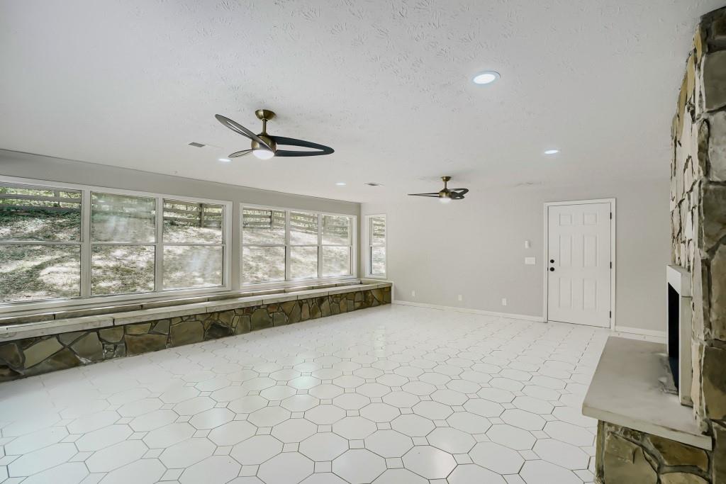 2021 Irwin Bridge Road Northwest Conyers, GA 30012 - Photo 22 of 43 a view of an empty room with a window