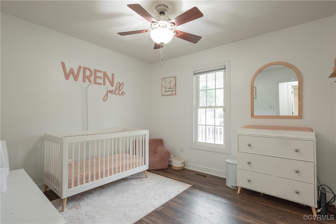 1315 Mill Road Aylett, VA 23086 - Photo 25 of 33 a bedroom with windows and a chandelier fan