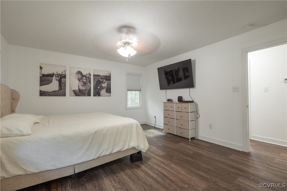 1315 Mill Road Aylett, VA 23086 - Photo 32 of 33 a bed room with furniture and a flat screen tv