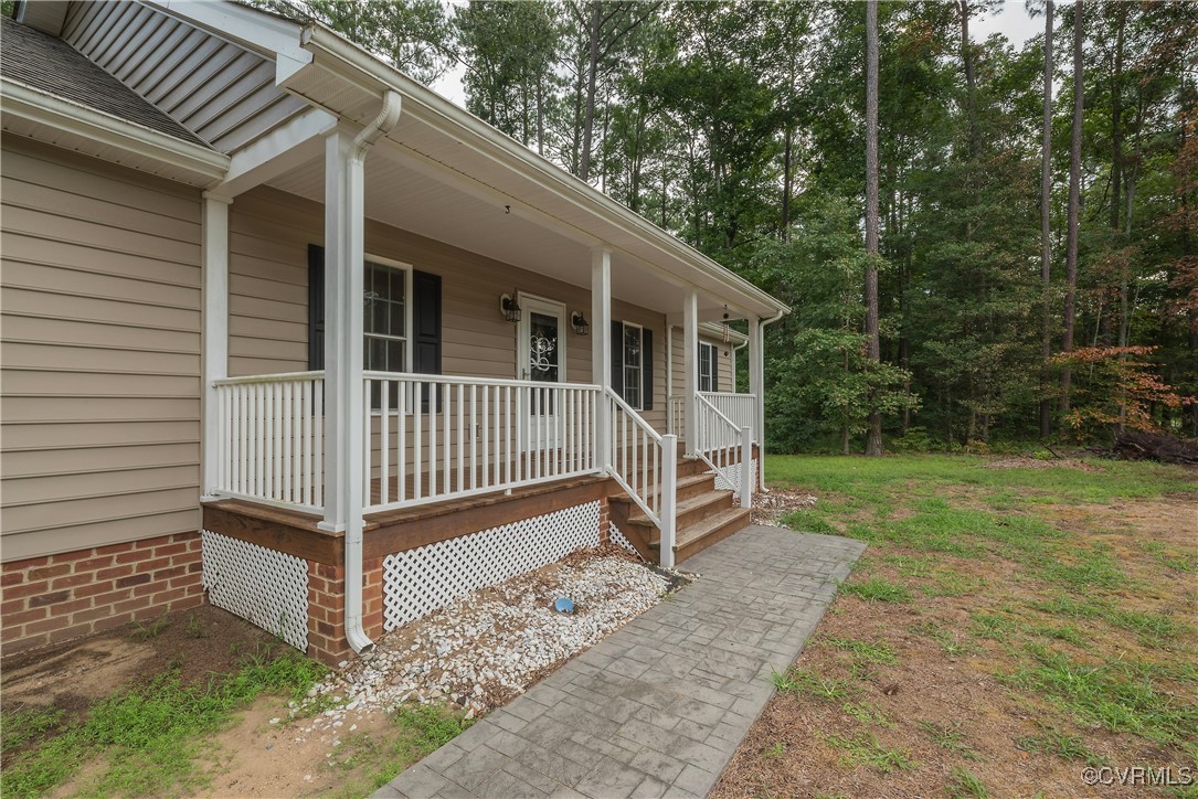 1315 Mill Road Aylett, VA 23086 - Photo 4 of 33 a view of a house with a yard and sitting area