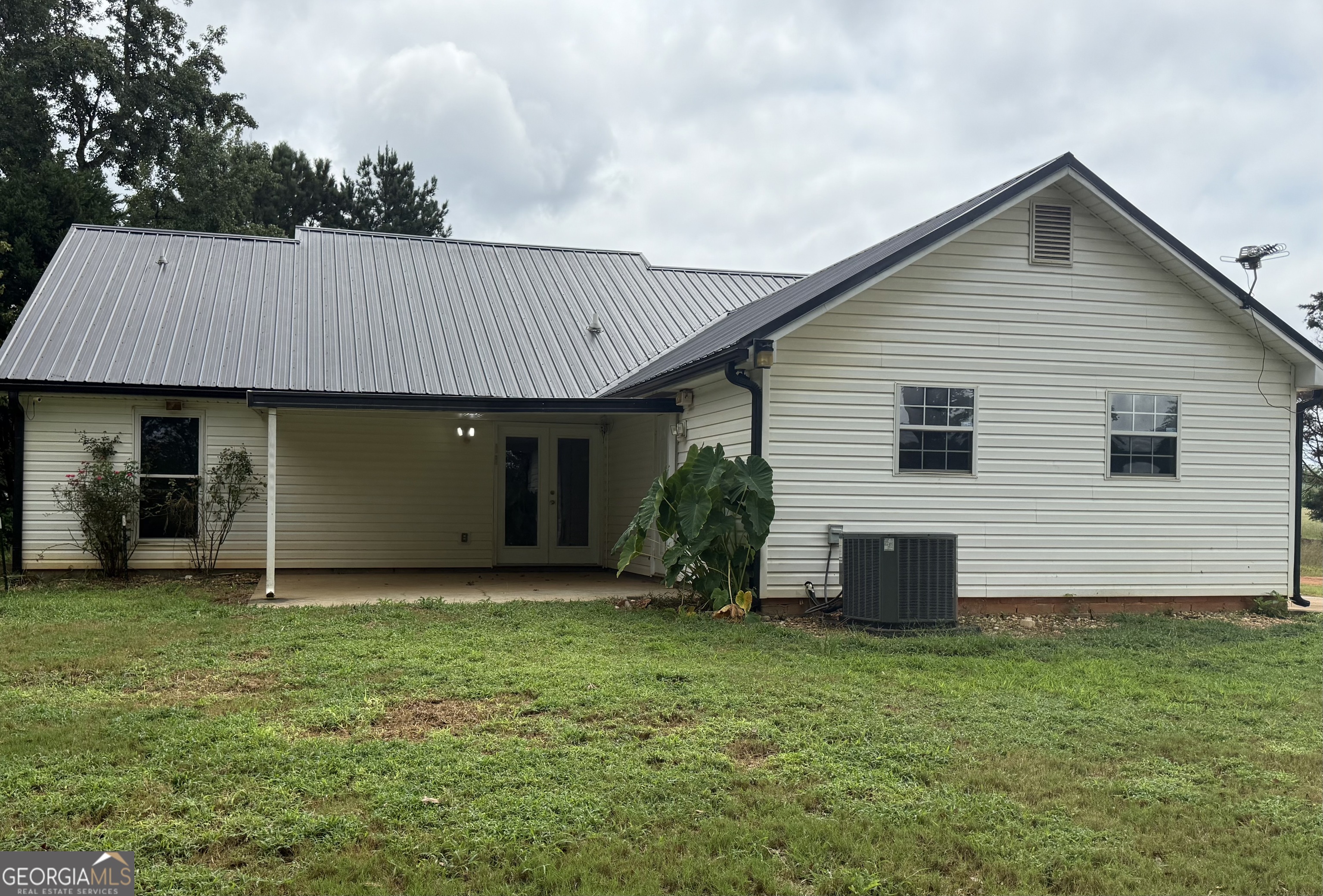 323 Snapping Shoals Road McDonough, GA 30252 - Photo 2 of 20 a view of a house with a yard
