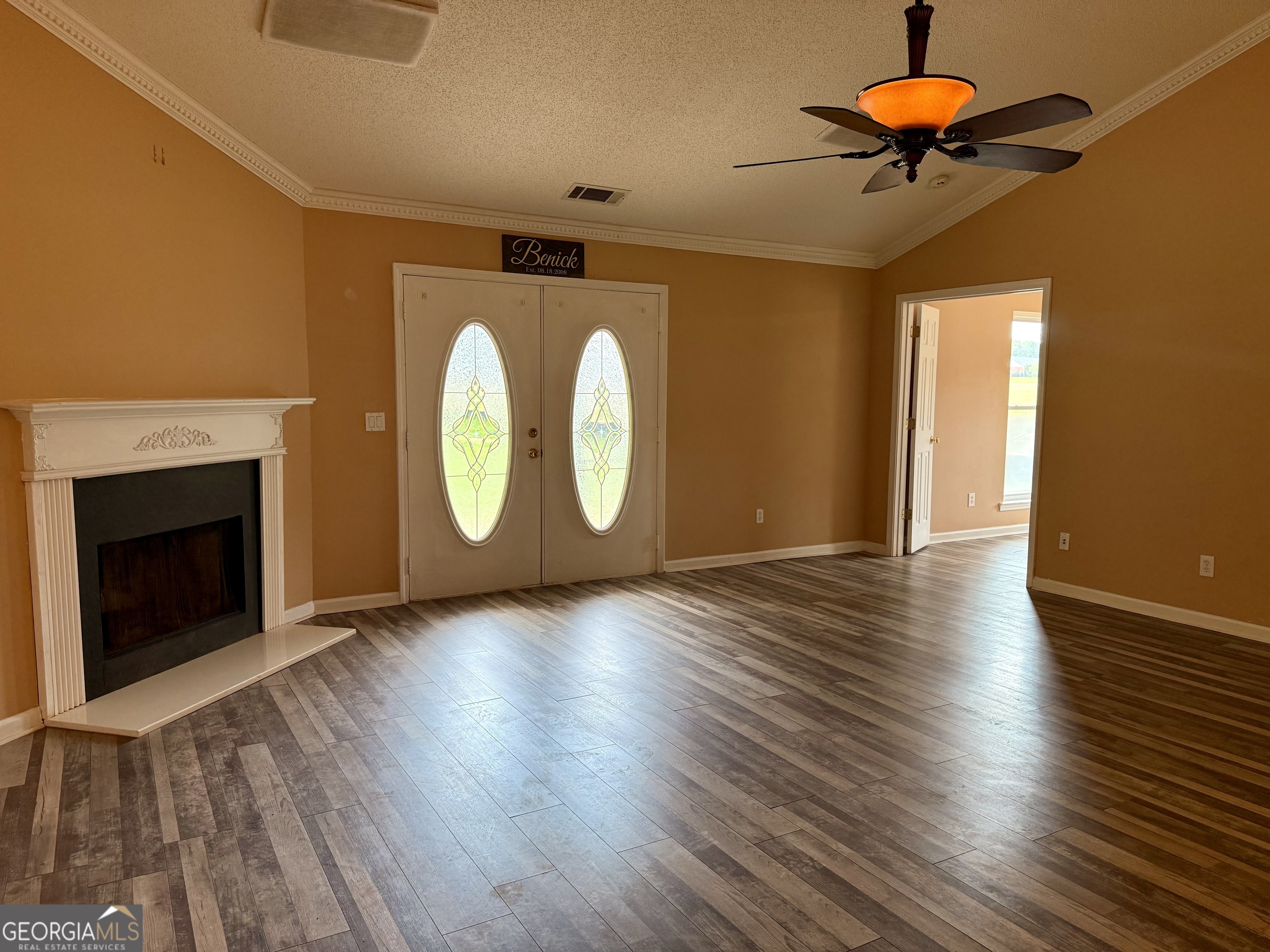 323 Snapping Shoals Road McDonough, GA 30252 - Photo 5 of 20 a view of a livingroom with wooden floor
