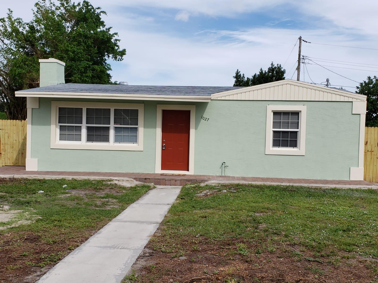 1027 Beech Road West Palm Beach, FL 33409 - Photo 2 of 33 Front