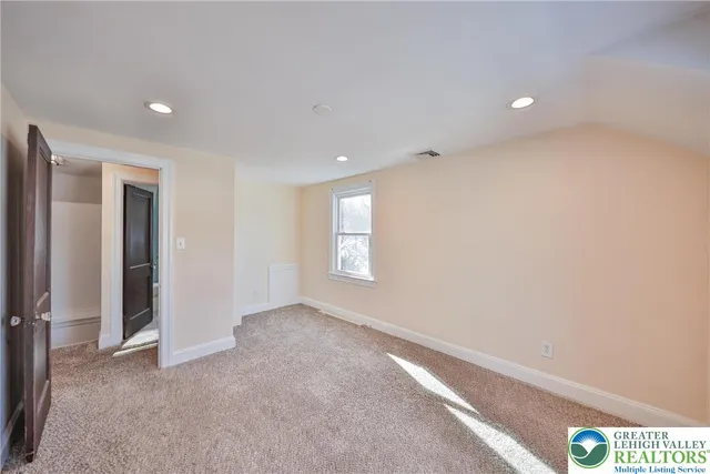 a utility room with sink dryer and washer