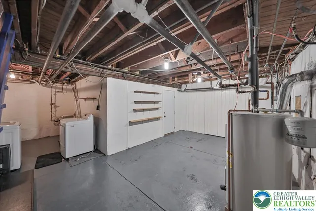 a front view of a house with parking area