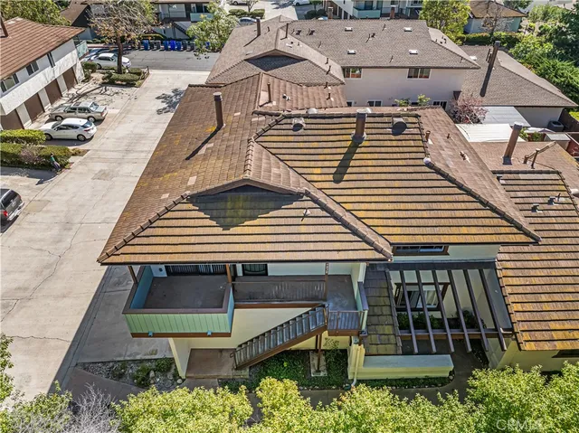 an aerial view of a house with a balcony