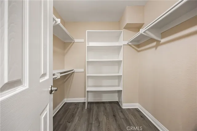 a balcony with furniture and a potted plant