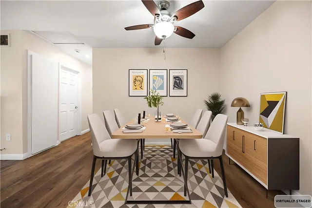 a view of a livingroom with furniture and a window