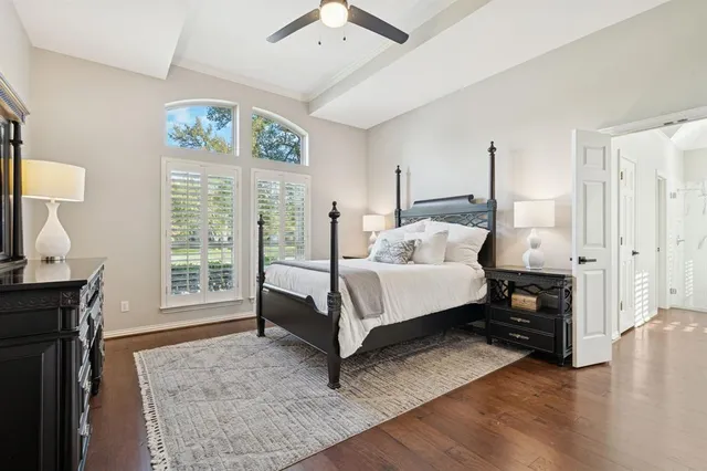 a bed room with a bed and a window