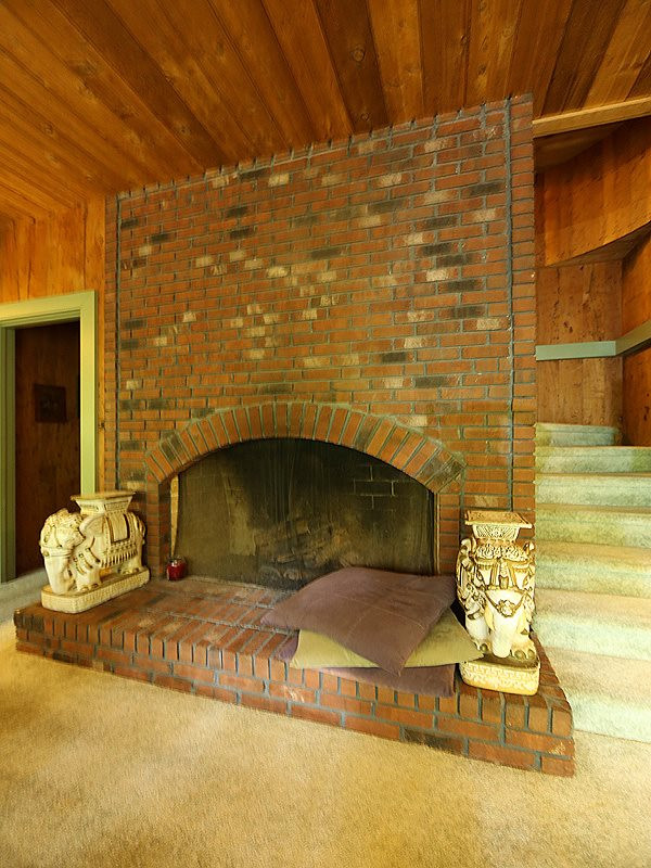 8600 Valley Brook Drive Raleigh, NC 27613 - Photo 16 of 25 In front of the gas fireplace on cool nights