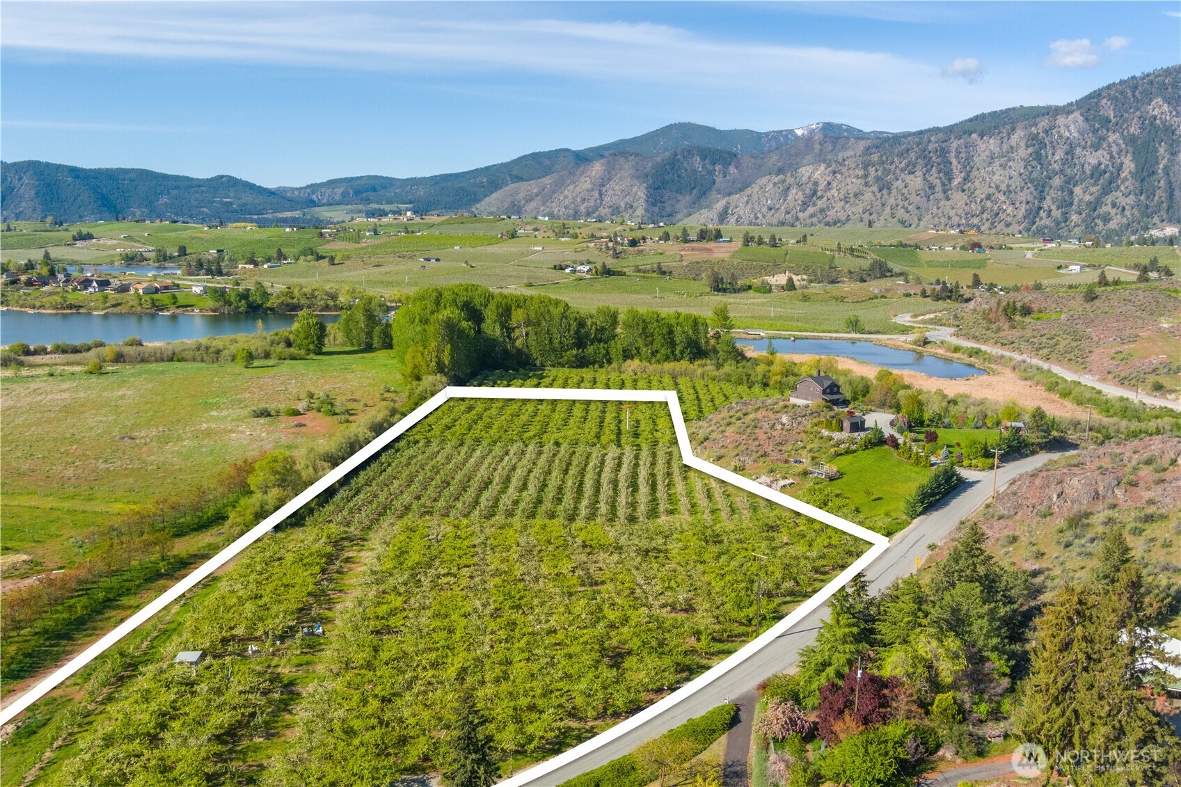 0 Lower Joe Creek Road Manson, WA 98831 - Photo 2 of 10 a view of lake with mountain