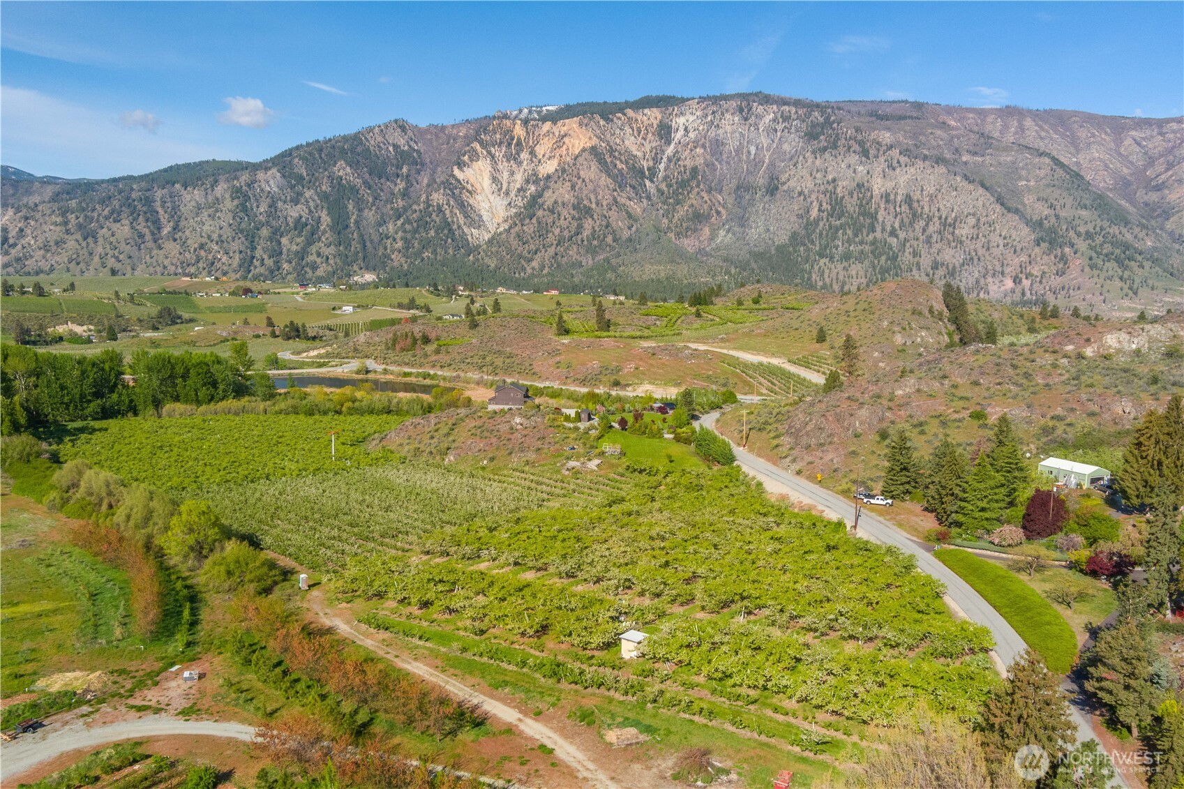 0 Lower Joe Creek Road Manson, WA 98831 - Photo 7 of 10 a view of a lake with a mountain