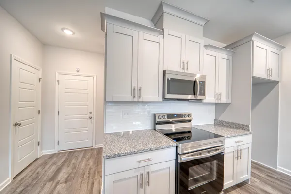a view of a kitchen counter top space and a sink