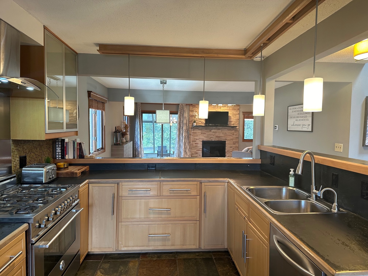 2326 South Staley Road Champaign, IL 61822 - Photo 4 of 7 a kitchen with a sink and stove