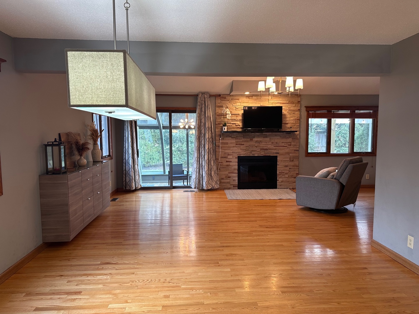 2326 South Staley Road Champaign, IL 61822 - Photo 6 of 7 a living room with furniture and a fireplace