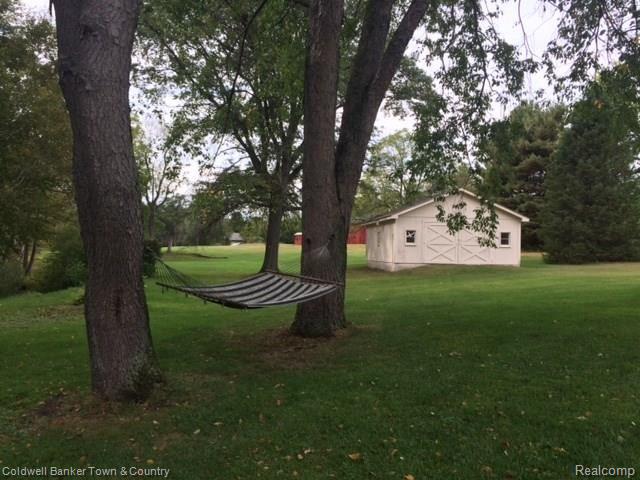 4770 Golf Club Road Howell, MI 48843 - Photo 11 of 59 Relaxing setting in back yard