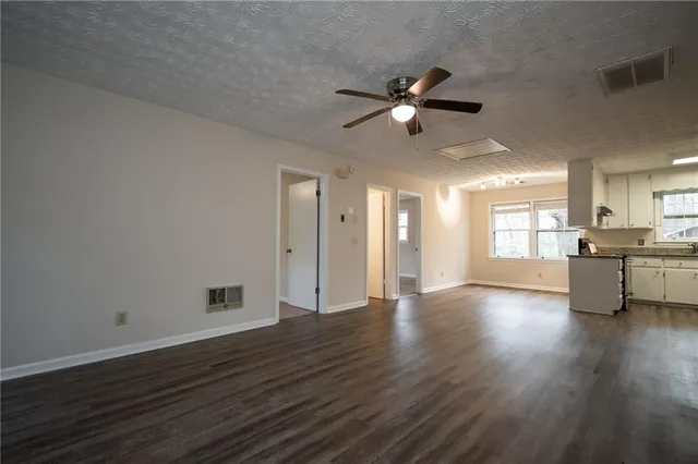 a view of an empty room and window
