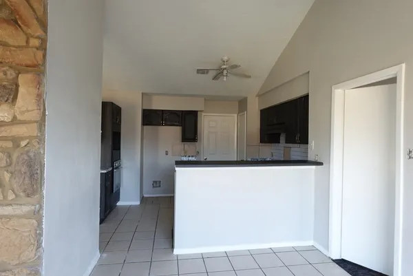 a view of a kitchen with a sink