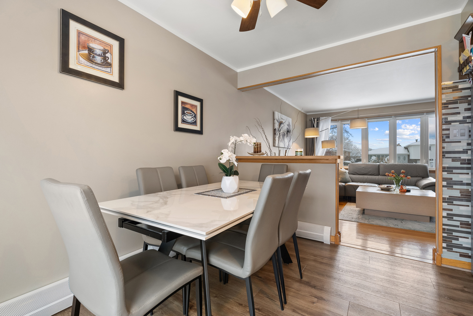 8232 Ferdinand Avenue Bridgeview, IL 60455 - Photo 11 of 35 a view of a dining room with furniture and wooden floor
