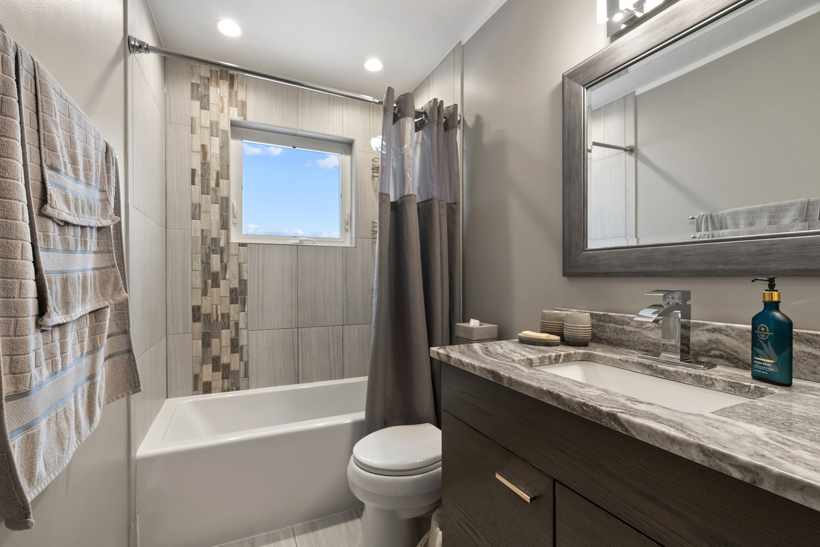 8232 Ferdinand Avenue Bridgeview, IL 60455 - Photo 13 of 35 a bathroom with a granite countertop sink toilet and shower