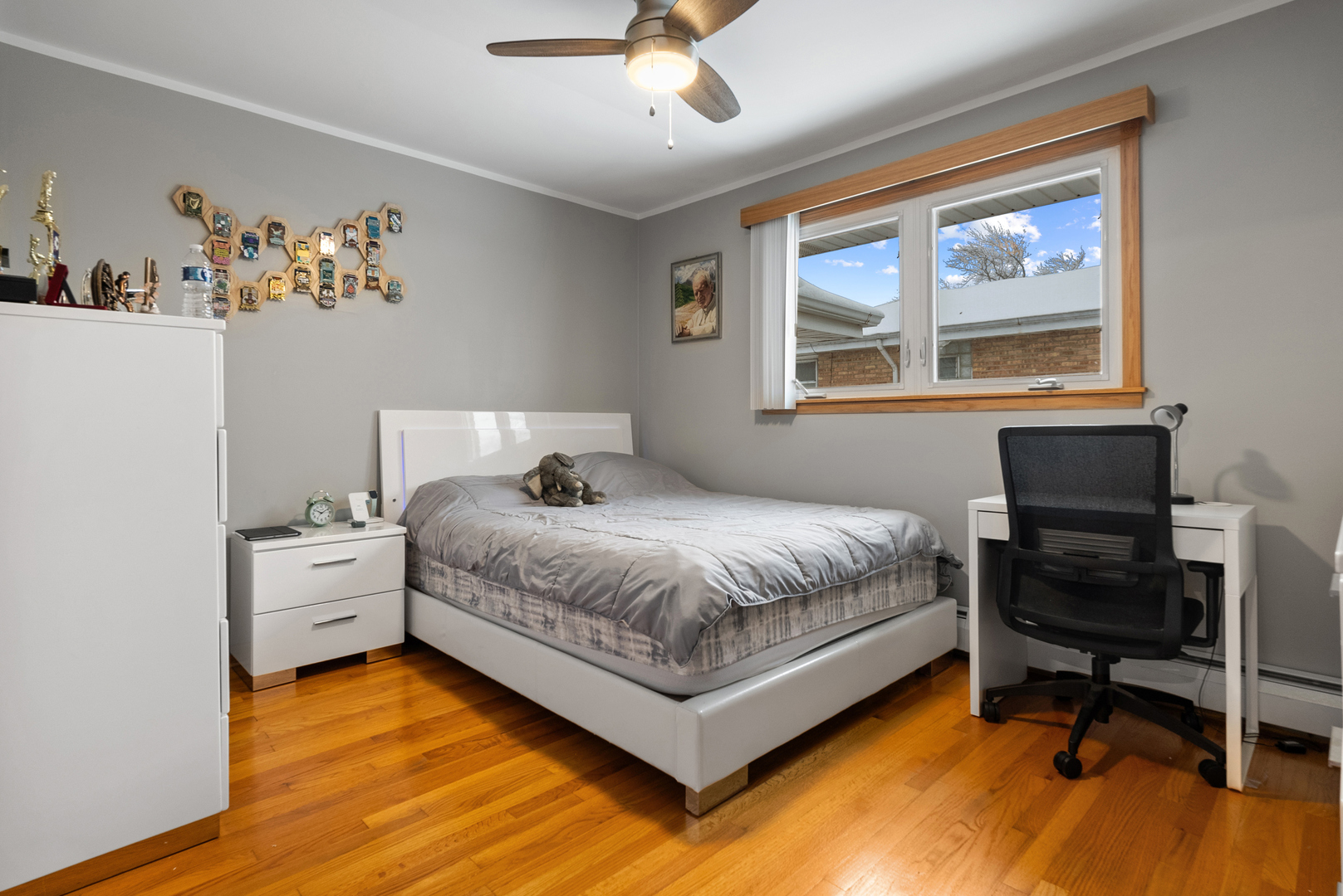 8232 Ferdinand Avenue Bridgeview, IL 60455 - Photo 17 of 35 a bedroom with a bed and a window