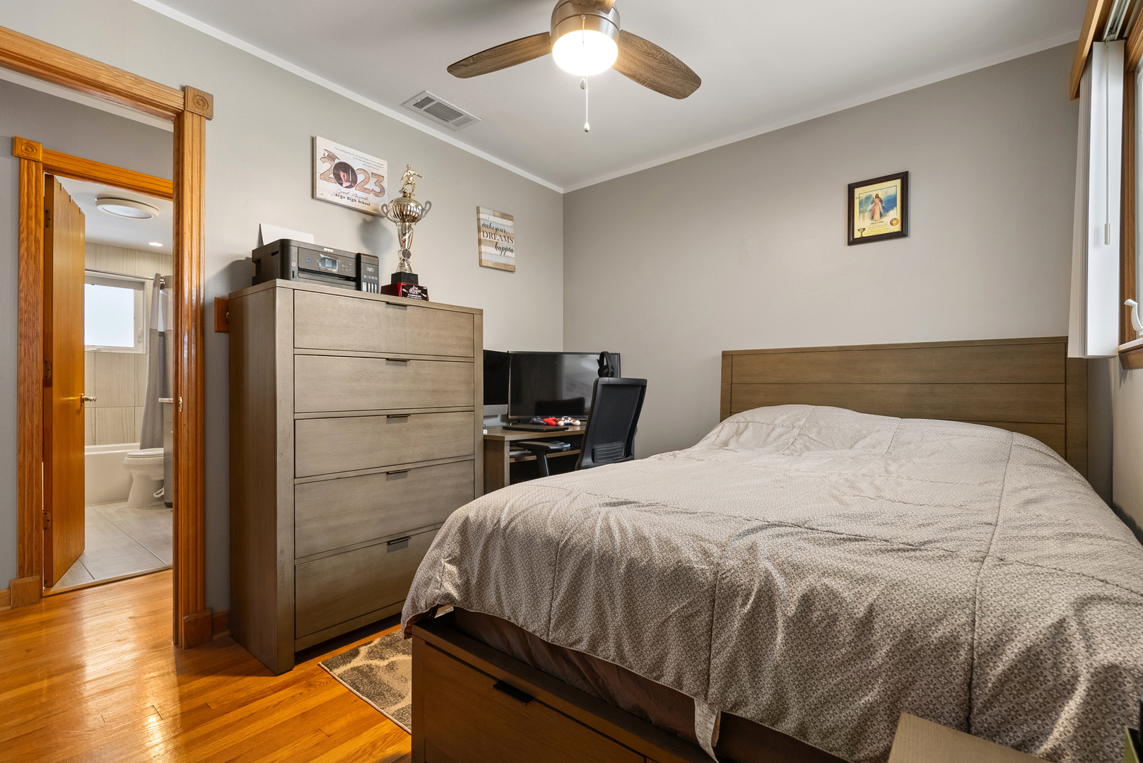 8232 Ferdinand Avenue Bridgeview, IL 60455 - Photo 20 of 35 a bedroom with a bed and wooden floor