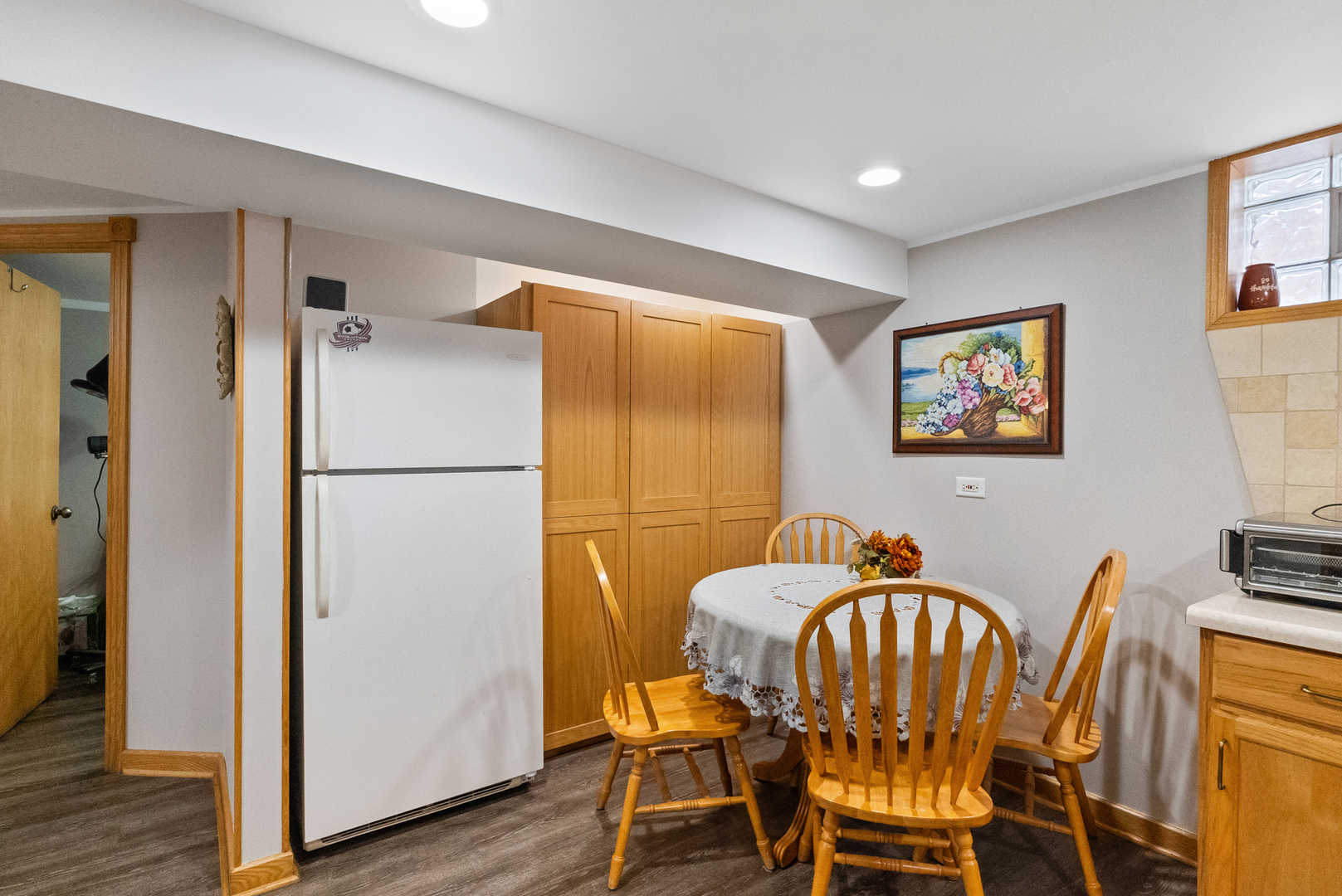 8232 Ferdinand Avenue Bridgeview, IL 60455 - Photo 34 of 35 a dining room with furniture and wooden floor