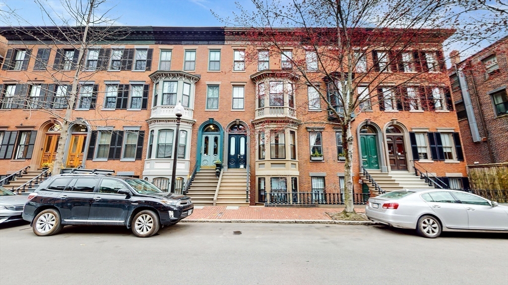 143 West Canton Street, Unit 4 Boston, MA 02118 - Photo 13 of 15 a car parked in front of a building