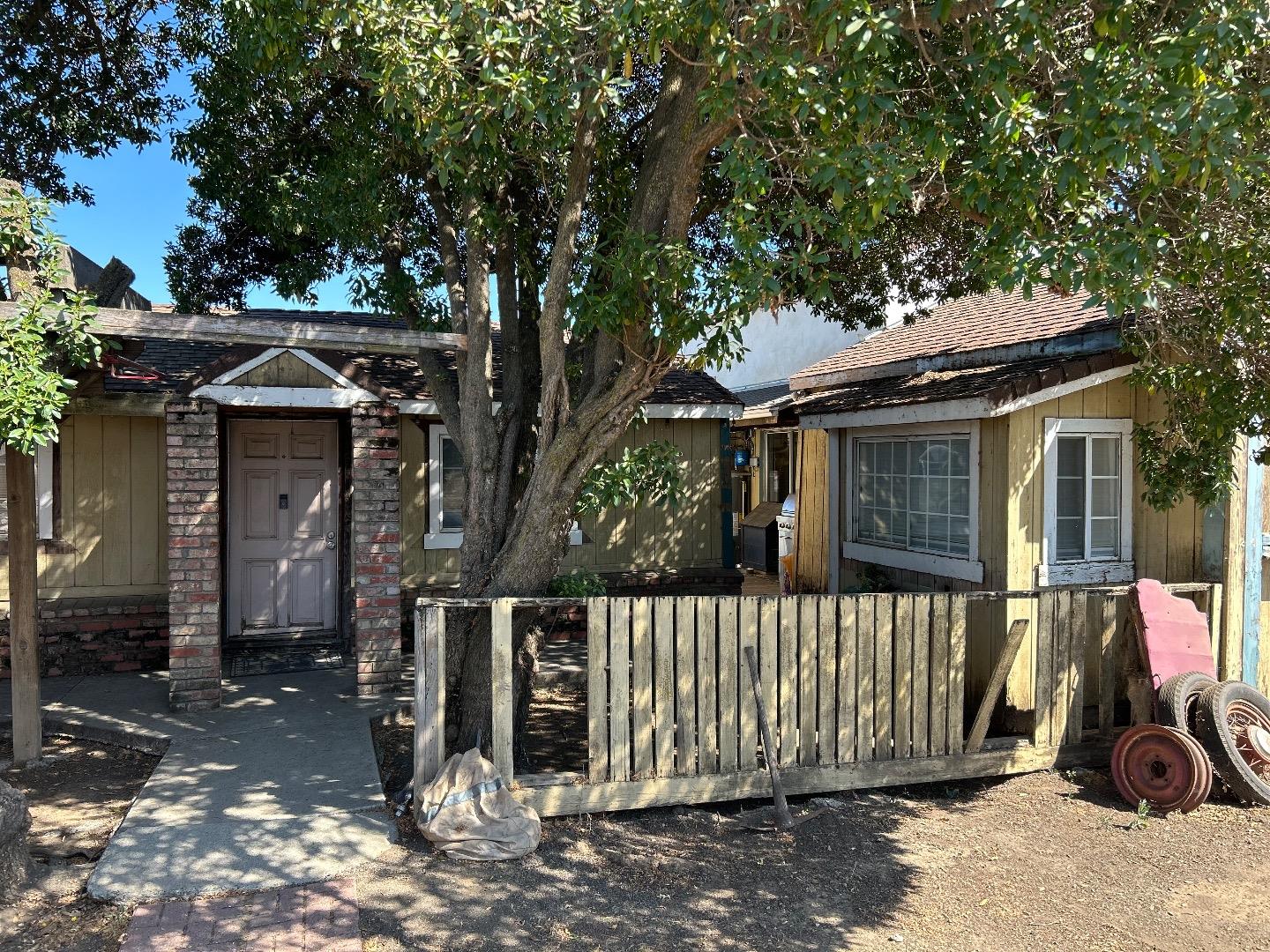 0 Undisclosed Address Gilroy, CA 95020 - Photo 2 of 18 a front view of a house with a tree