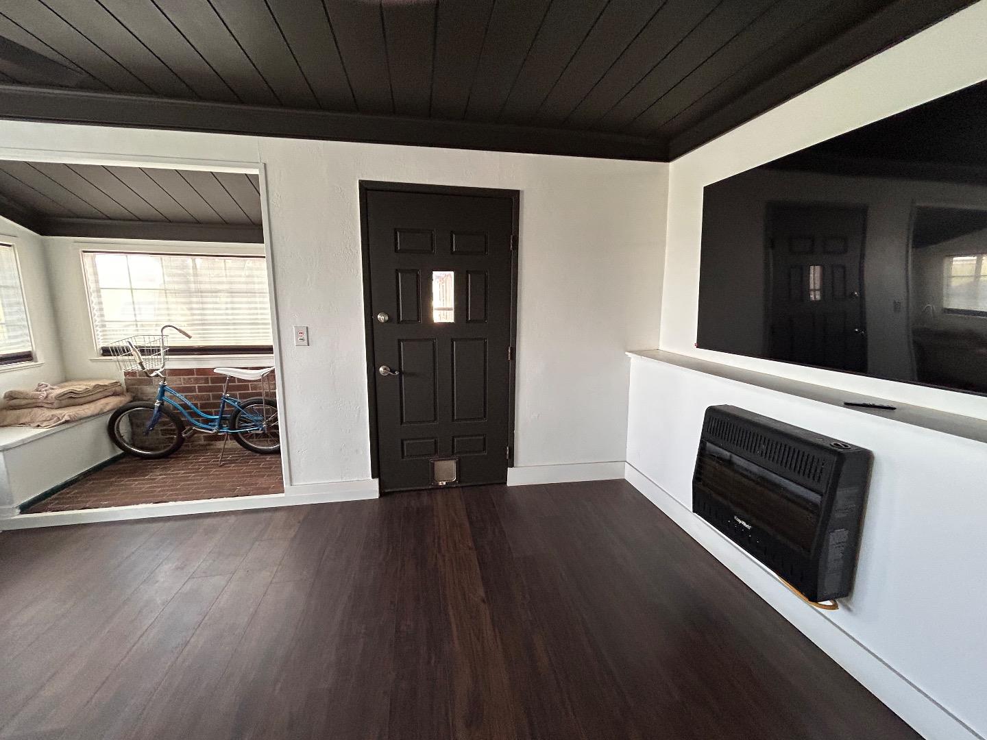 0 Undisclosed Address Gilroy, CA 95020 - Photo 8 of 18 a view of an empty room with wooden floor and a window